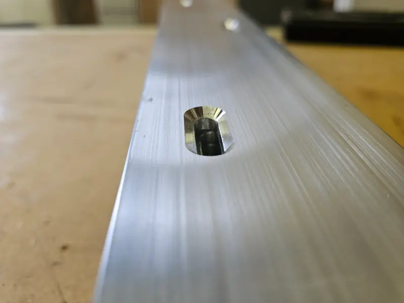 Close-up of a machined slot in an aluminium bar