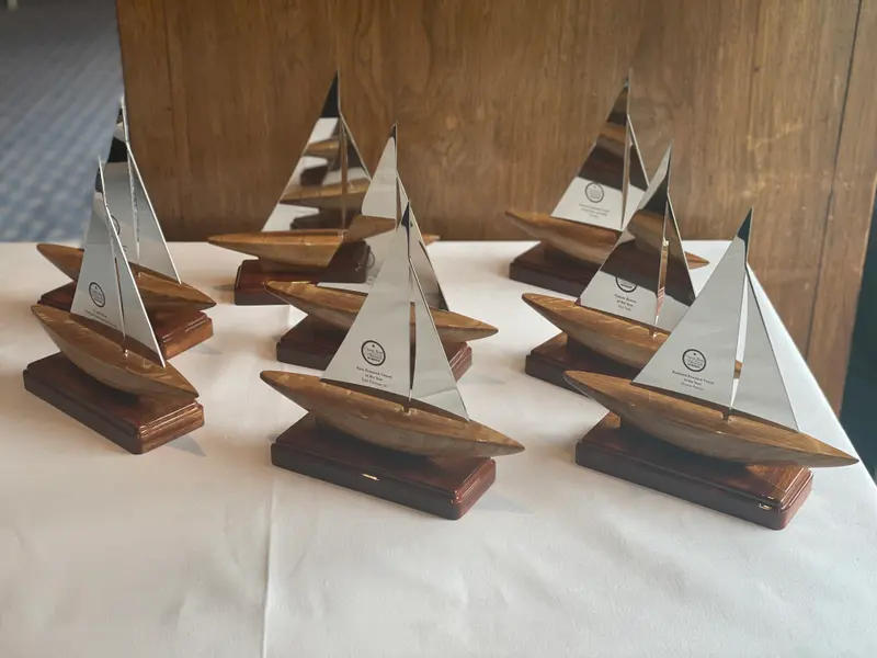 Set of sailing trophies with timber hulls and stainless steel sails